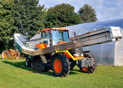 Kubota 126 Tractor & Harvesting Swingable-Belt.